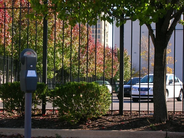 Source street scene with one car.